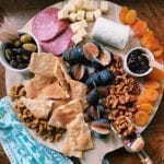 charcuterie board with homemade rosemary garlic crackers
