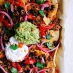 Close up of sheet pan nachos supreme