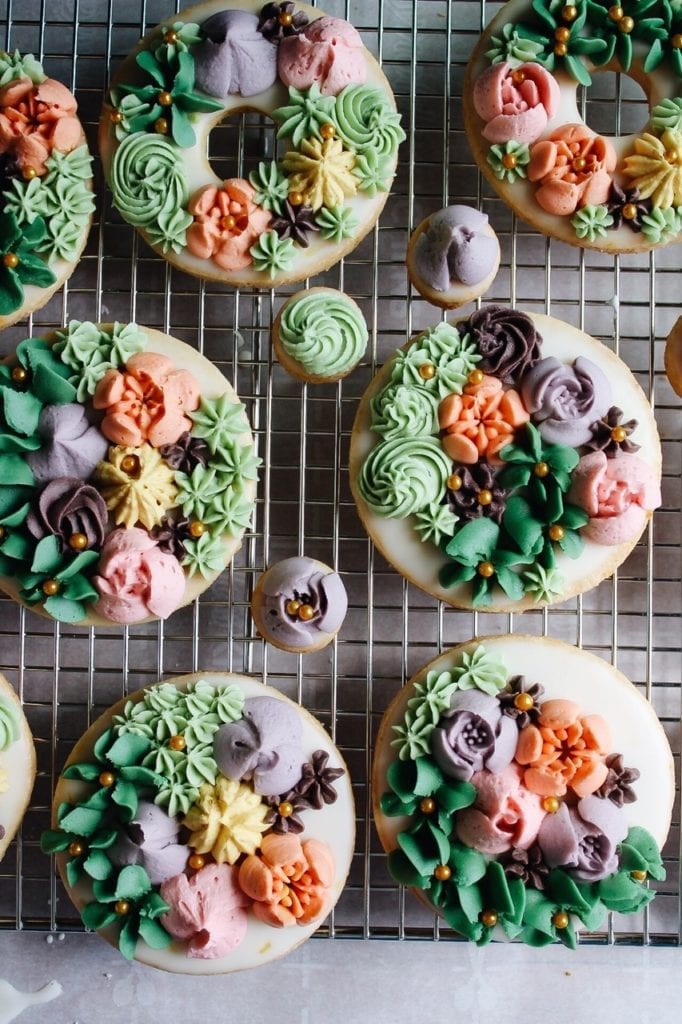 Springy decorated cookies on a cooling rack 