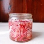 Side view of pickled onion jar