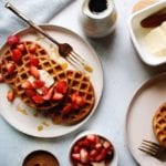 Sourdough discard waffles with strawberries and butter on top