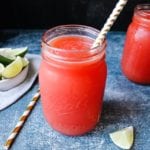 watermelon juice in a glass jar with a cute straw