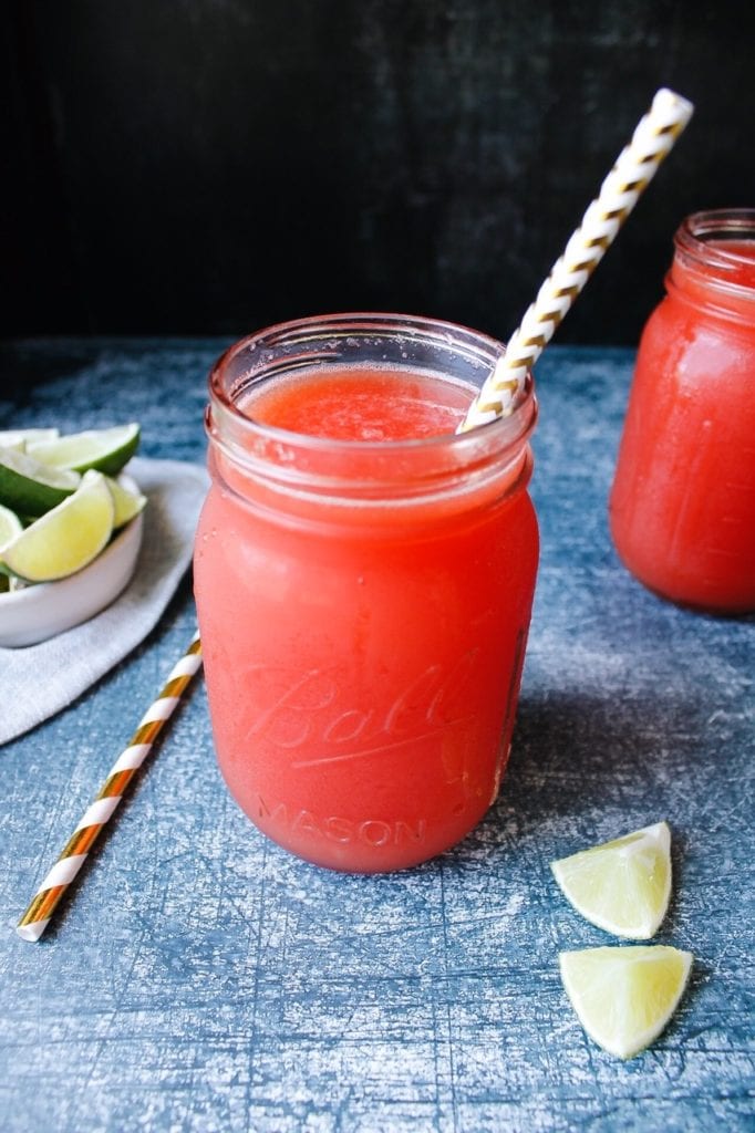 watermelon juice in a glass jar with a cute straw