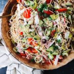 zesty italian pasta salad in a brown bowl