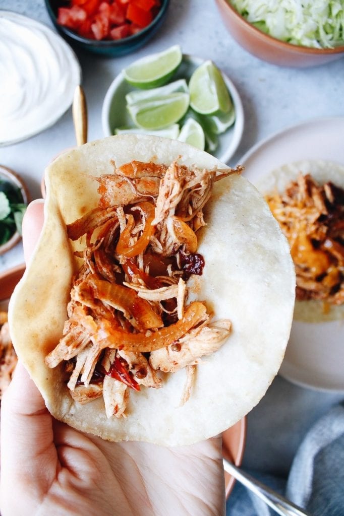 chipotle chicken inside a corn tortilla