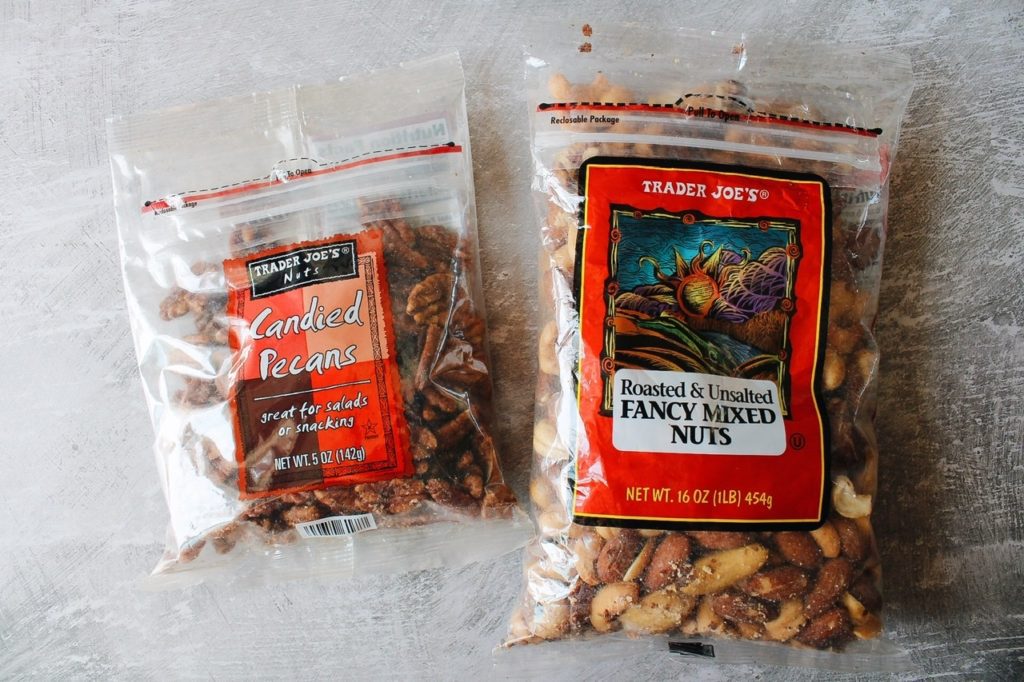 bag of candied pecans and bag of fancy mixed nuts from trader joes