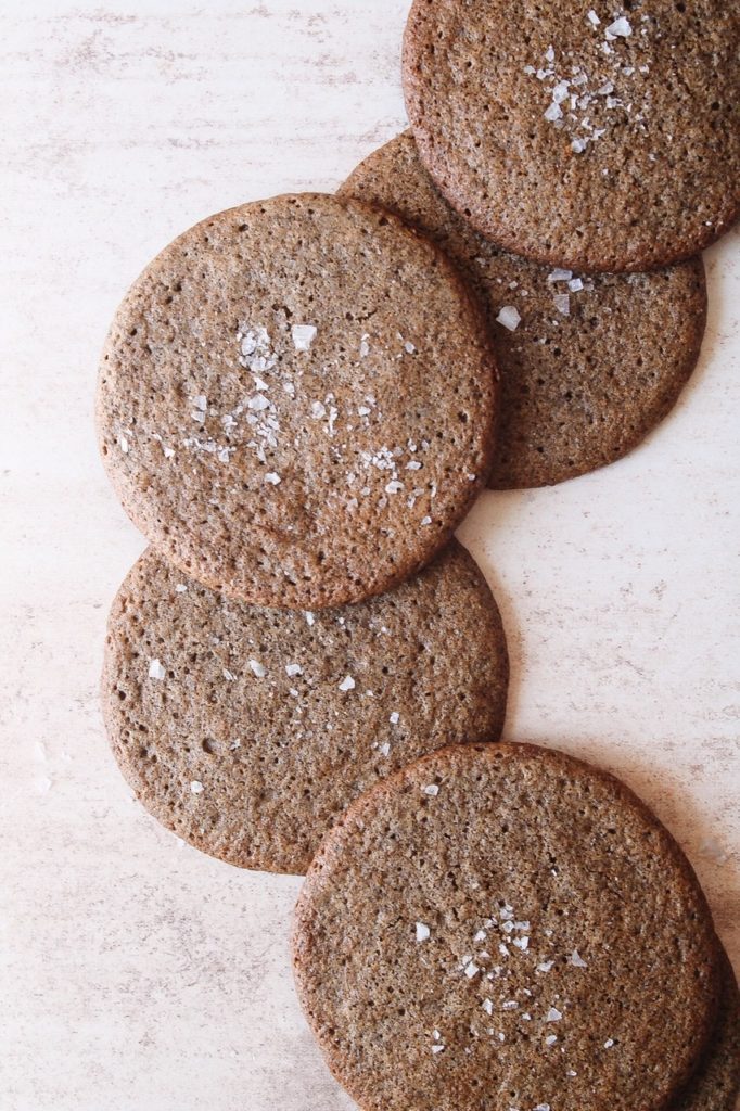 buckwheat and honey cookies with sea salt arranged in a line