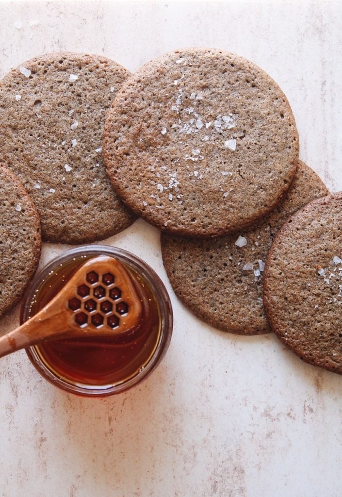 buckwheat and honey cookies with a jar of honey