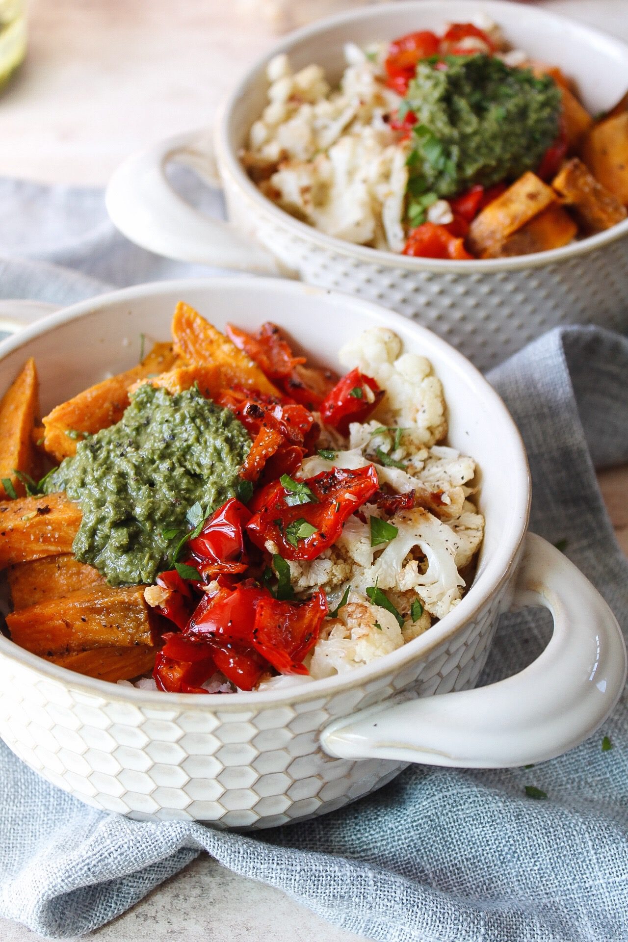 hearty earth bowl topped with pesto