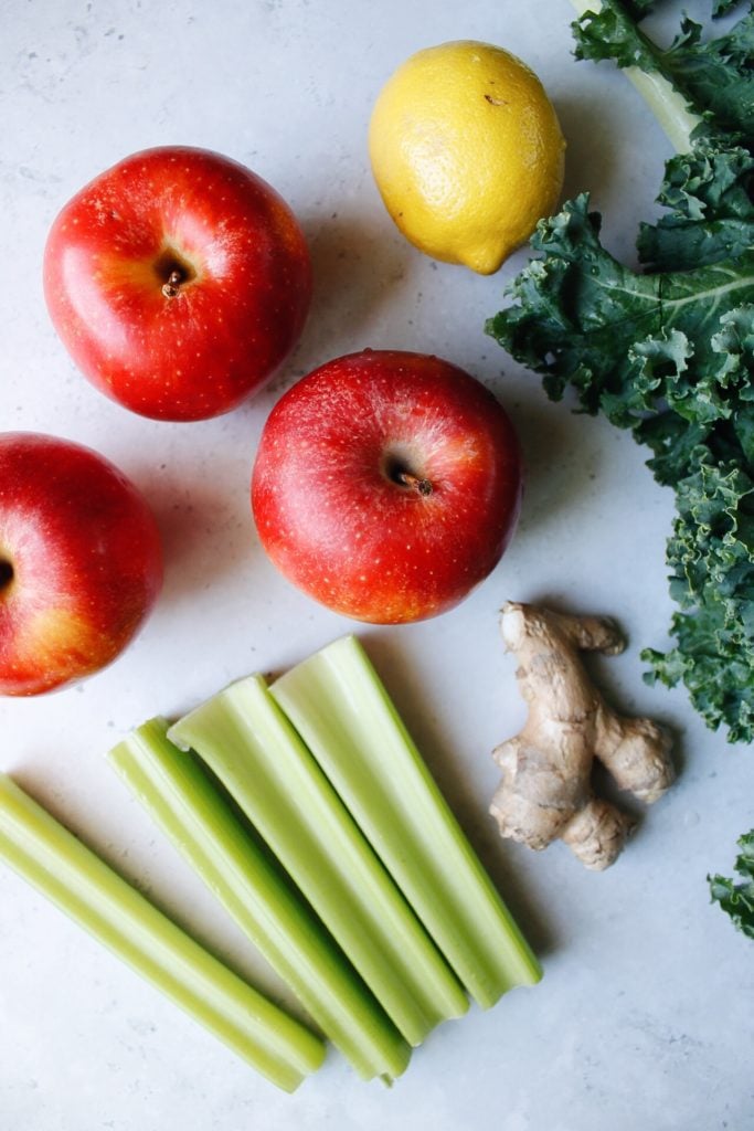 ingredients for green juice with kale apple celery
