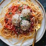 turkey meatballs without breadcrumbs on a plate of spaghetti