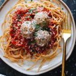 turkey meatballs made without breadcrumbs on top of spaghetti and marinara