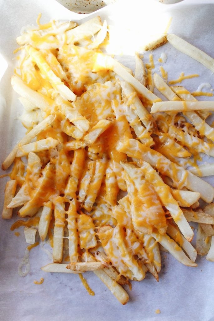 french fries topped with cheese