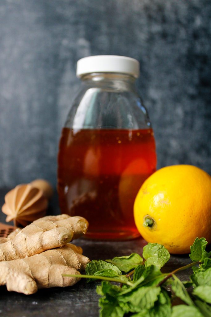 ingredients for ginger mint tea, ginger, mint, honey, lemon