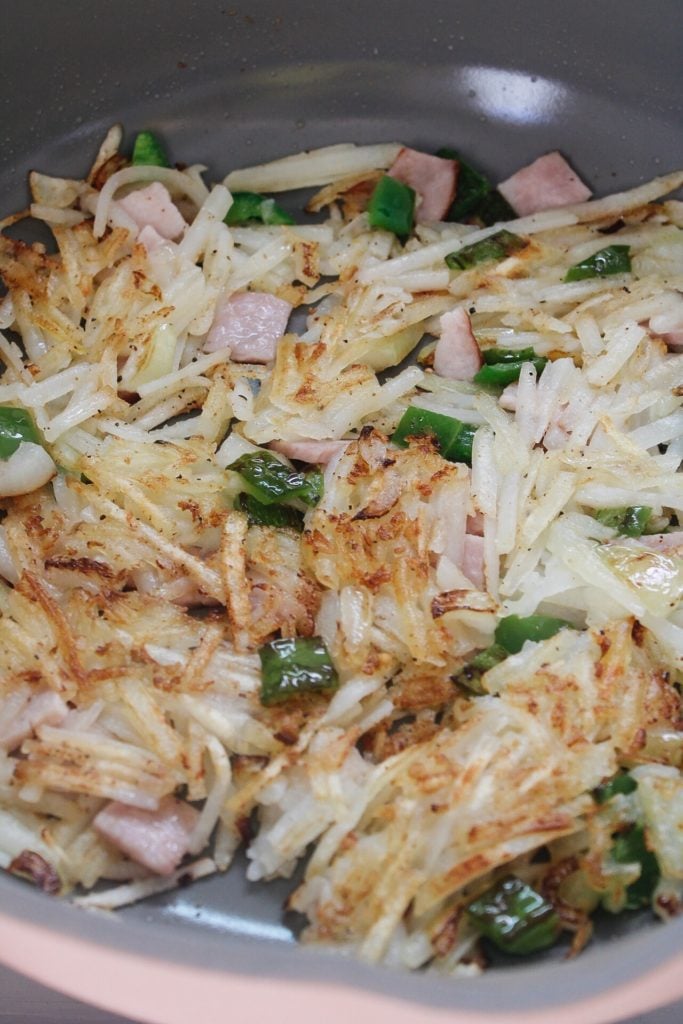 breakfast hash flipped in the pan