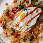 ham and pepper hash topped with an egg