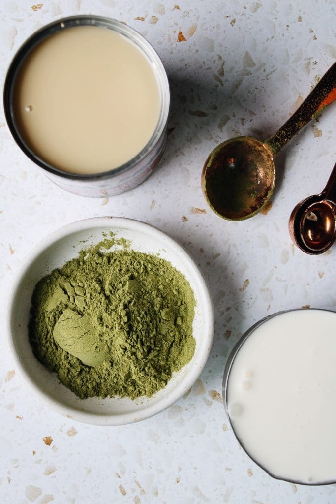 ingredients for no-churn matcha ice cream: matcha powder, heavy whipping cream and sweetened condensed milk