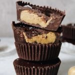 close up of sunflower seed butter cups stacked on top of each other