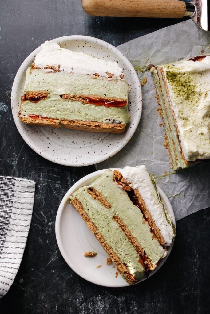 matcha cheese cake sliced on plates.