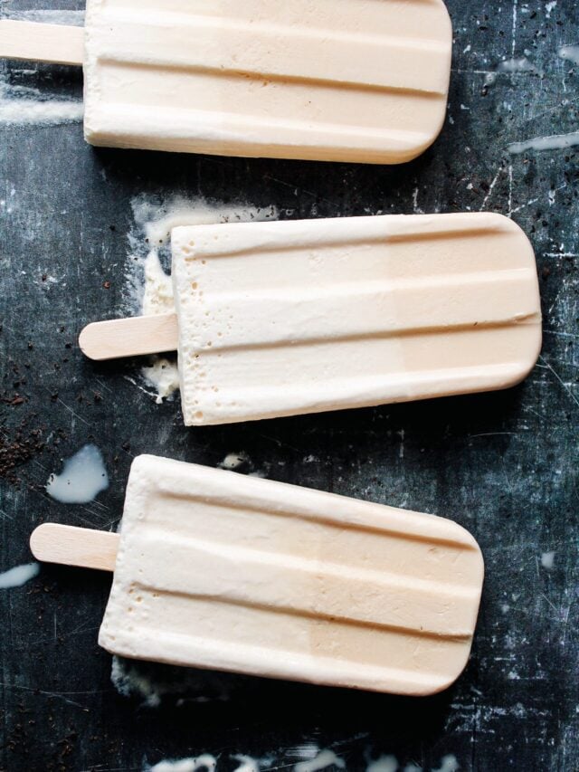 earl grey ice cream pops on a dark blue background