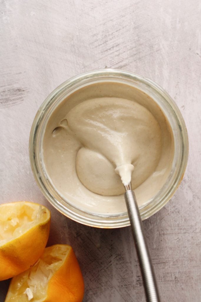 tahini lemon garlic sauce in a jar