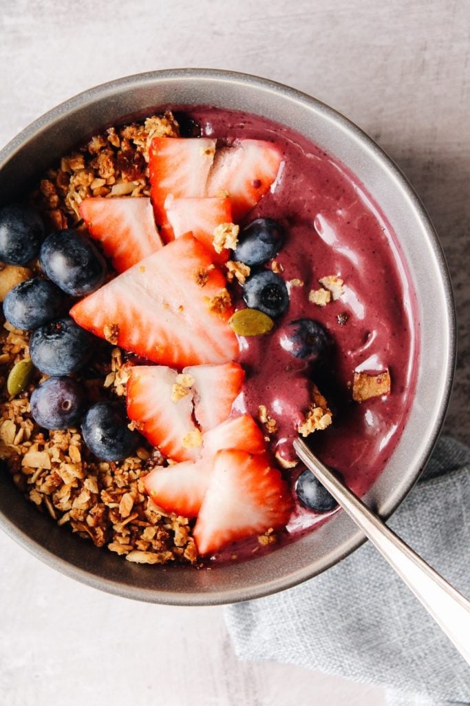trader joe's acai bowl topped with granola and berries