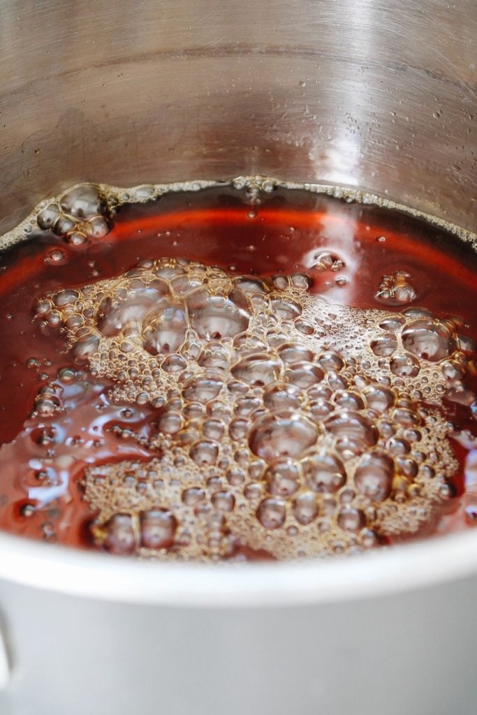 earl grey syrup boiling and simmering in a pot