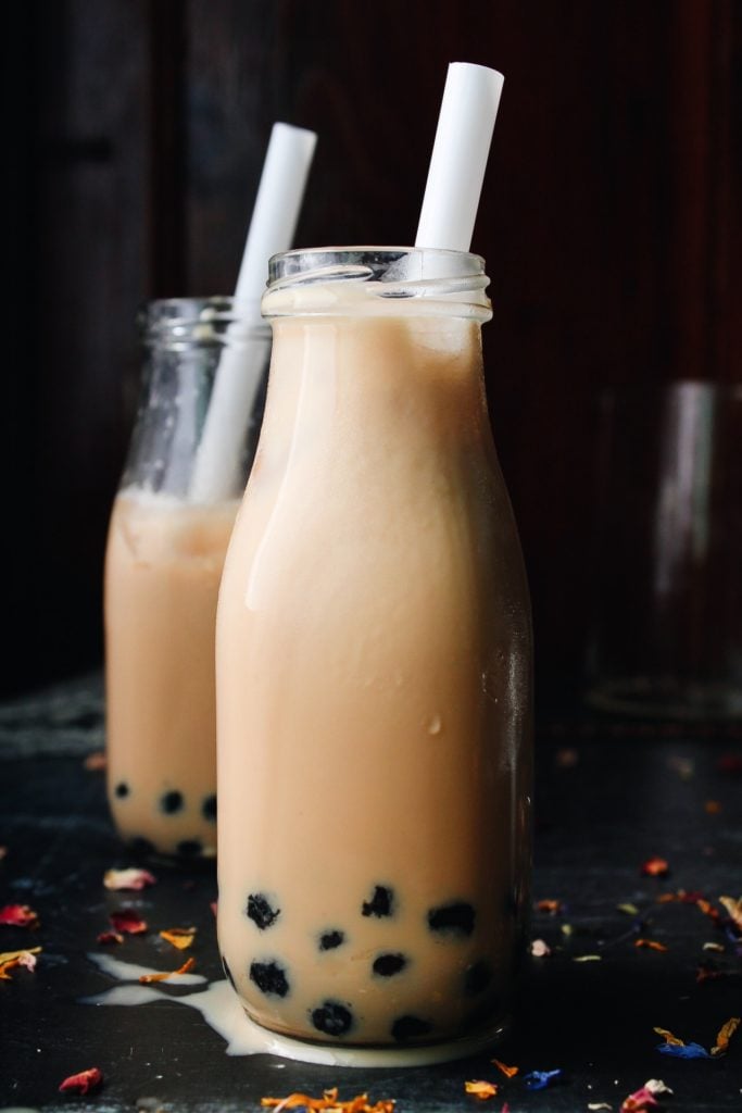 earl grey milk tea in a clear glass bottle