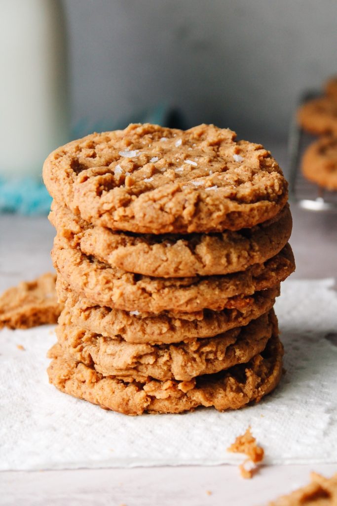 a stack of gluten free peanut butter cookies on a napkin
