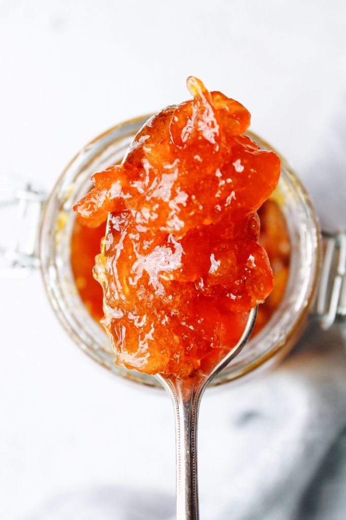 kumquat jam on a spoon
