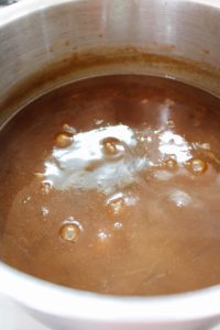 pumpkin spice syrup gently boiling in a pot