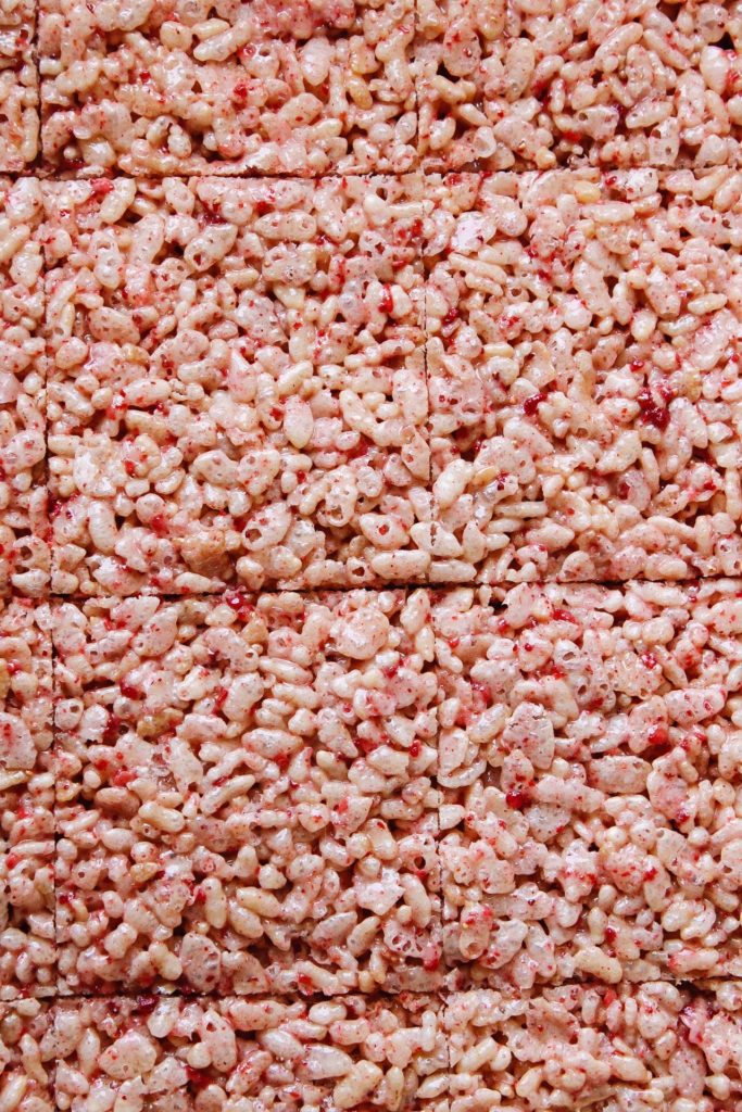 cooled strawberry rice krispie treats cut into bars