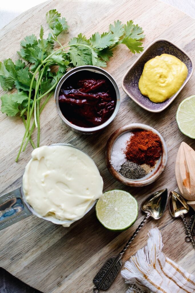 ingredients for subway chipotle southwest sauce on a wooden board