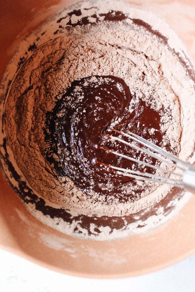 dry ingredients being added to brownie batter