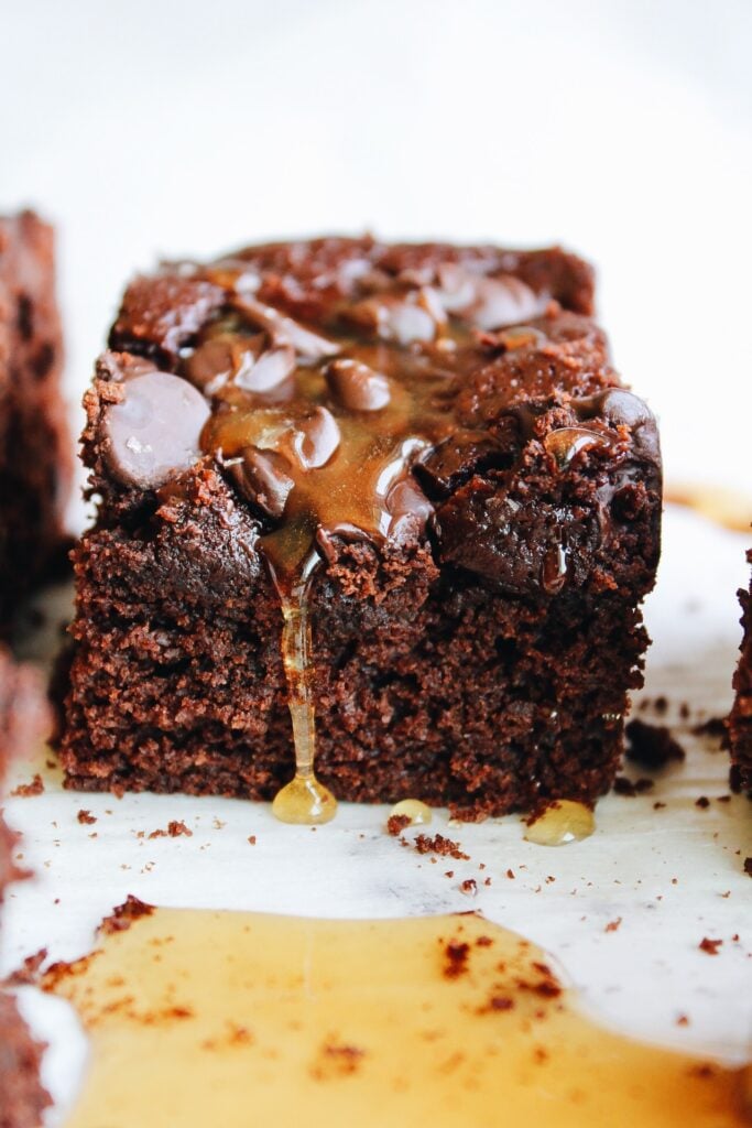 close up of honey brownies with honey dripping down the front