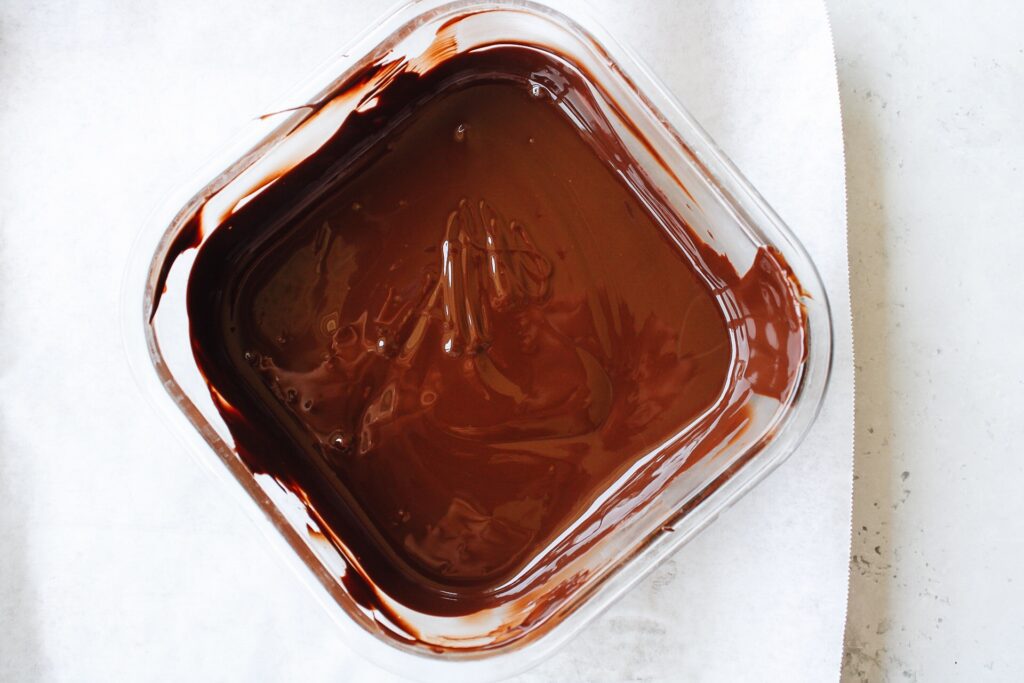 melted chocolate in a microwave safe bowl

