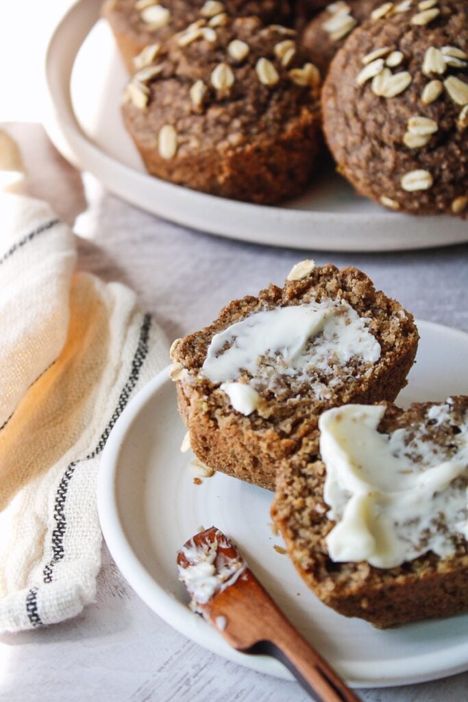 Buckwheat muffin cut in half and topped with butter