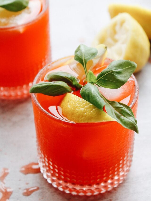 strawberry basil lemonade in a clear glass