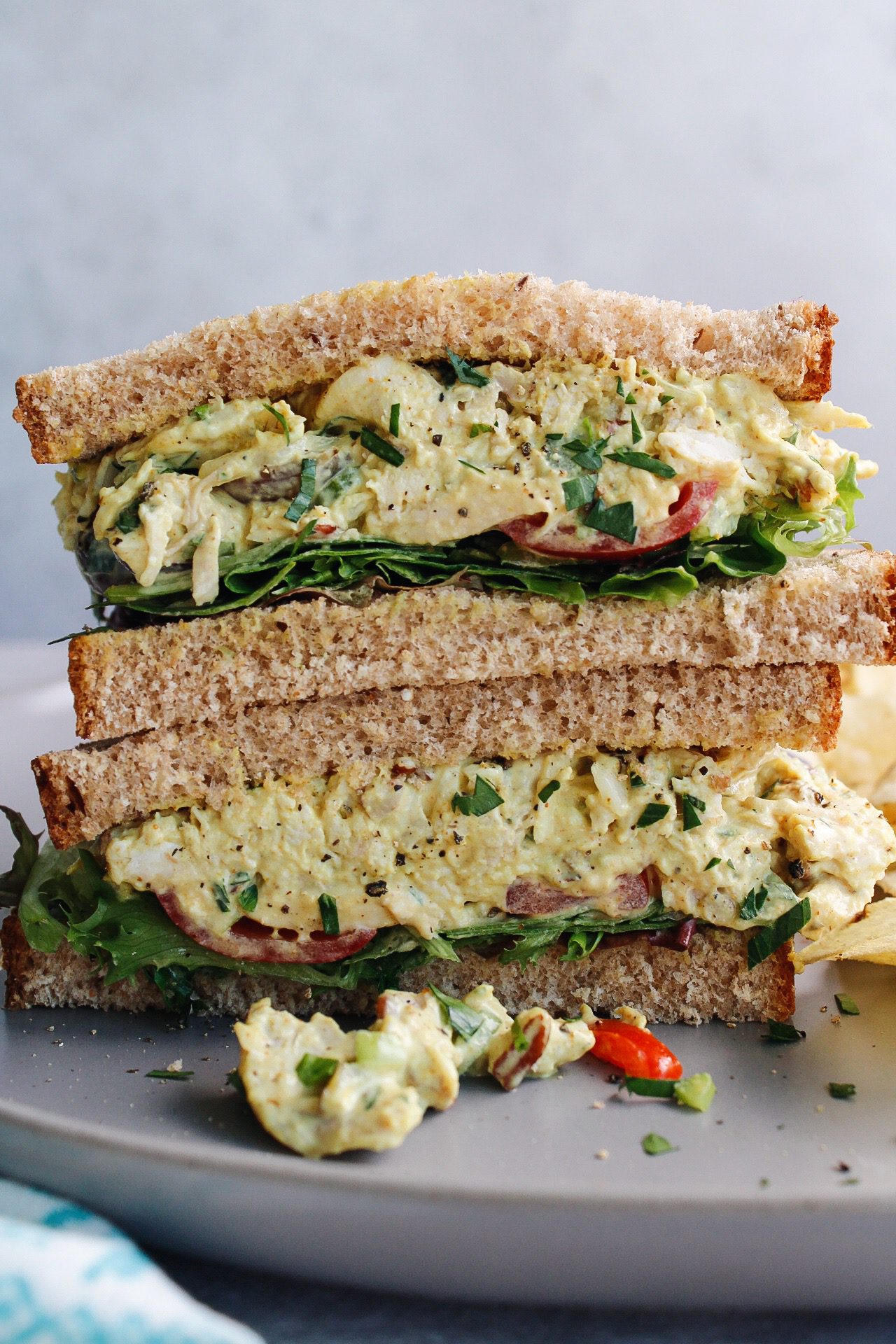 curry chicken salad sandwich cut in half and stacked