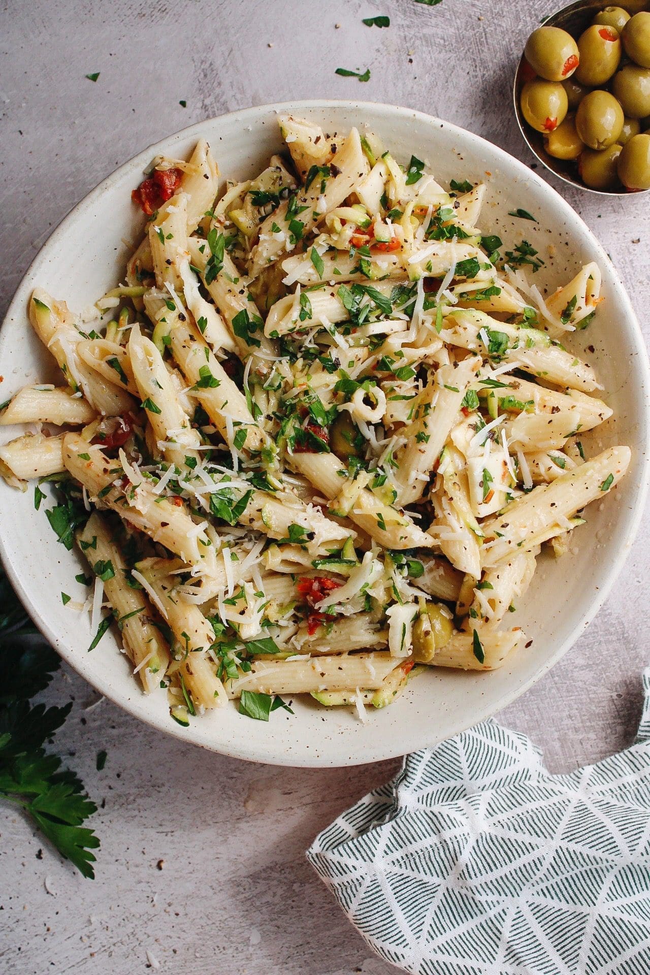 pasta salad with green olives and italian dressing sun-dried tomatoes, provolone italian pasta salad