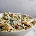 pasta salad with sun-dried tomatoes, green olives and provolone