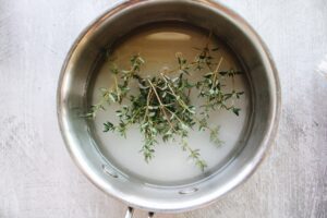 sugar, water and fresh thyme sprigs in a small pot