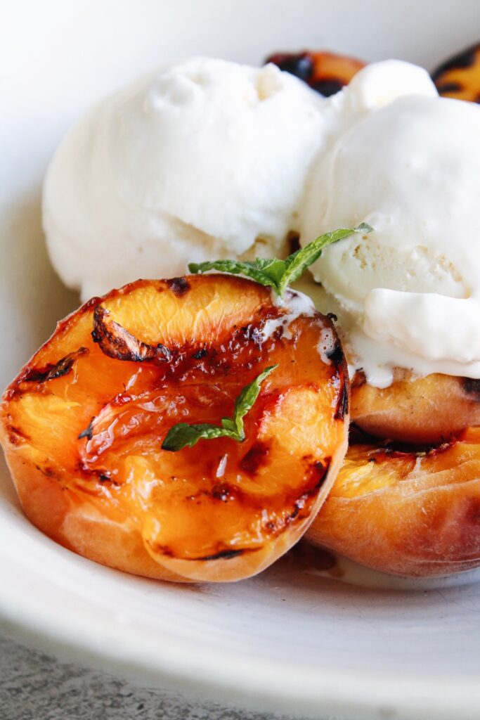 grilled peaches with vanilla ice cream and mint
