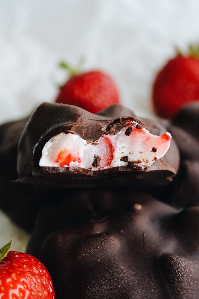 chocolate covered yogurt bite with strawberries