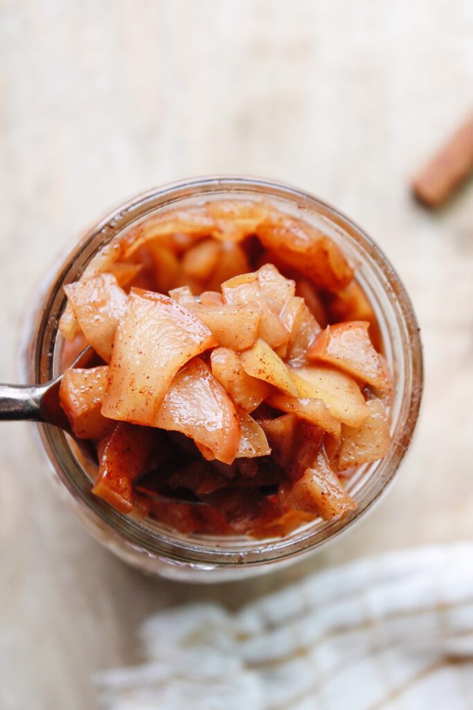 cinnamon apple compote in a glass jar ready to store in the fridge