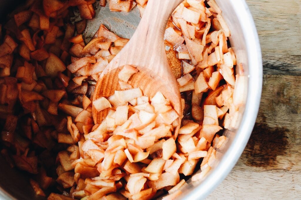 cooked cinnamon apple compote in a pot