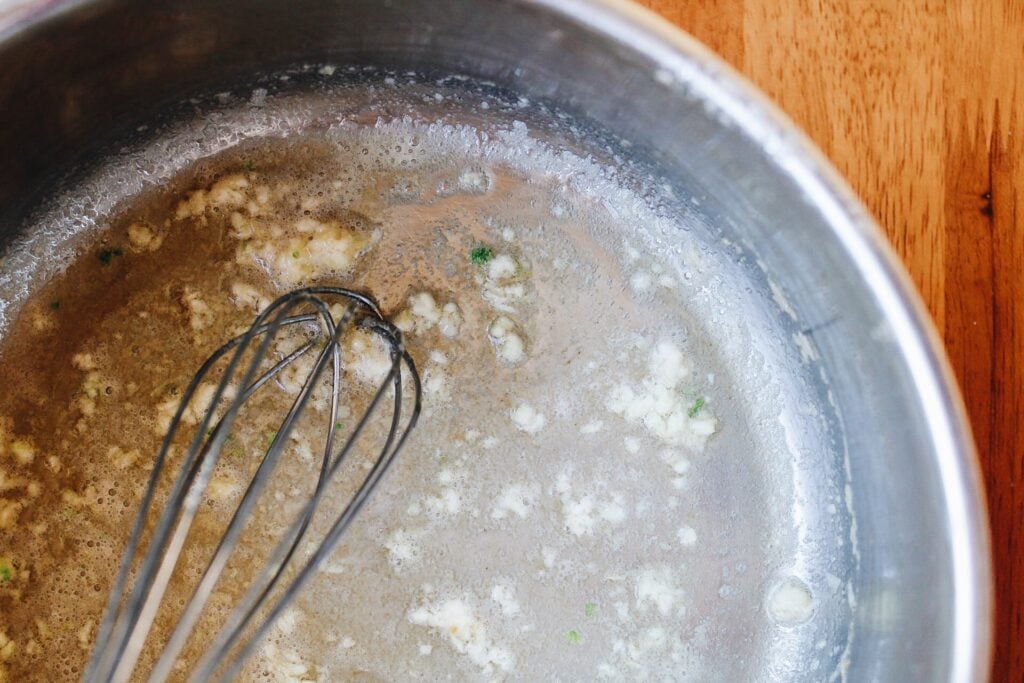 melted butter and minced garlic in a pot