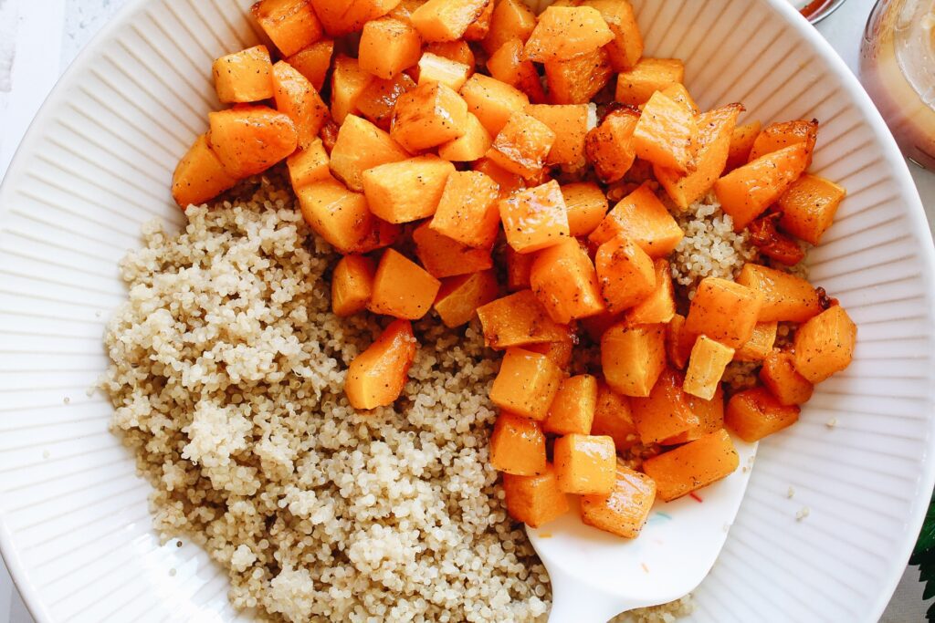 large bowl with quinoa and roasted butternut squash