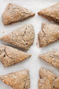 buckwheat scones arranged on baking sheet lined with parchment