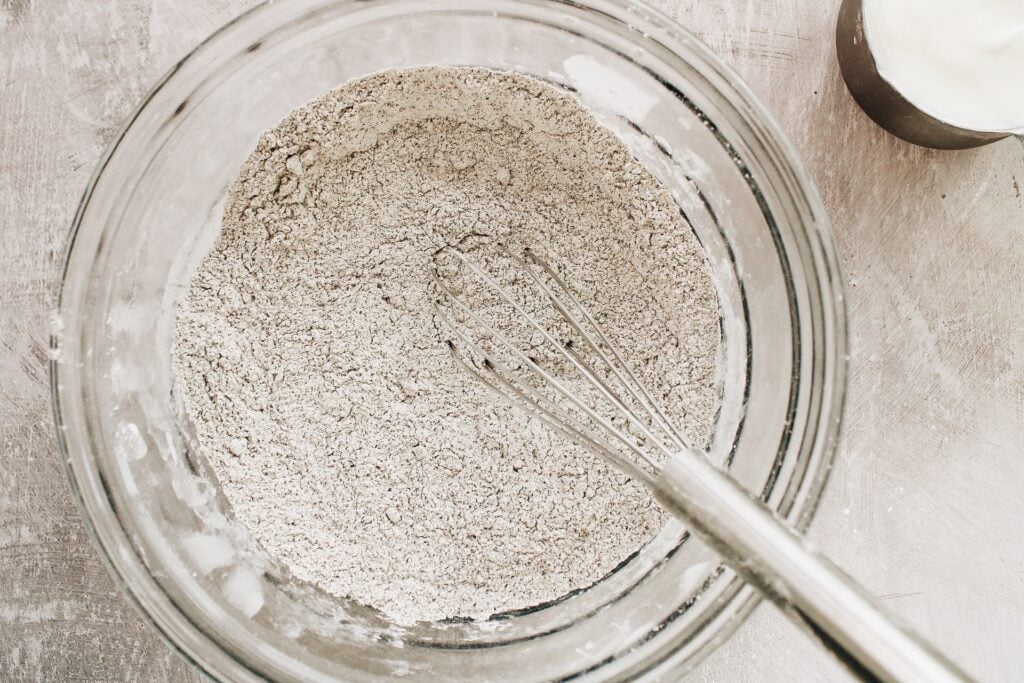 dry ingredients for buckwheat blueberry muffins in a glass bowl